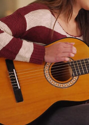 Nylon String Classical Acoustic Guitar Player