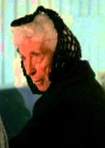 Old Woman at Airport